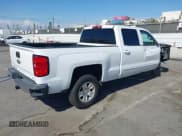 ✅ 2018 Chevrolet Silverado 1500 LT • VIN: 3GCPCREC7JG428237 • Lot: 43057683. Listed on IAAI with 137,294 mi. Free auction sales archive from the USA and detailed vehicle history report at DreamBid. Image 4.