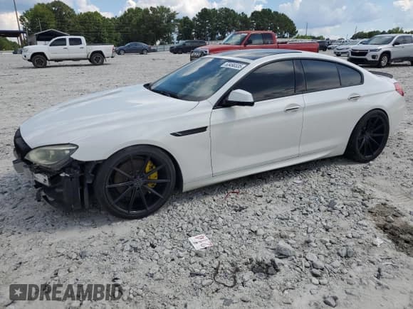 ✅ 2013 BMW 6 Series 650i • VIN: WBA6B2C51DDG66936 • Лот: 63490335. Опубликован ранее на Copart с пробегом 111 098 миль. Бесплатный доступ к архиву аукционных продаж из США и подробный отчёт об истории автомобиля на DreamBid. Изображение 1.