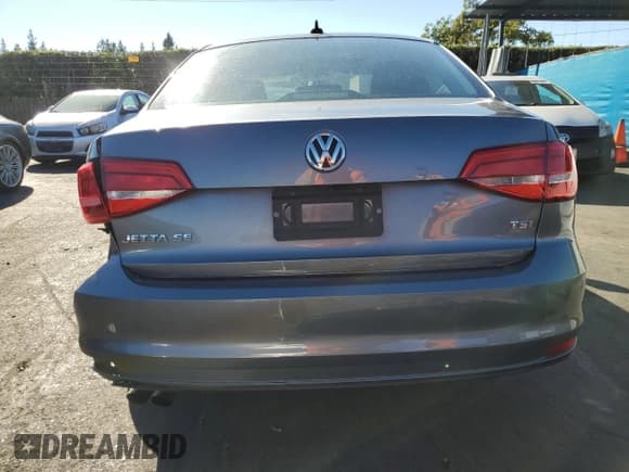 ✅ 2015 Volkswagen Jetta SE • VIN: 3VWD17AJ7FM268058 • Lot: 85205095. Listed on Copart with 64,778 mi. Free auction sales archive from the USA and detailed vehicle history report at DreamBid. Image 6.
