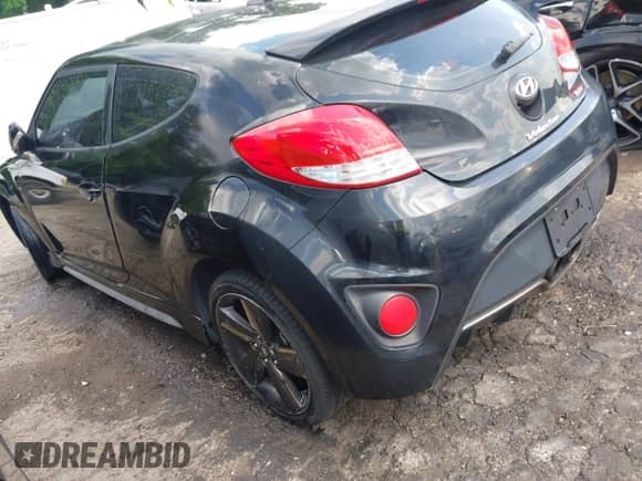 2013 Hyundai Veloster Turbo with VIN KMHTC6AE5DU143733, listed as a IAAI auction lot 42116317 with 116,155 mi miles and . Bid and sale history available at DreamBid. Image 3.