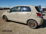 ✅ 2009 Toyota Yaris • VIN: JTDKT903095261501 • Lot: 82616345. Listed on Copart with 183,491 mi. Free auction sales archive from the USA and detailed vehicle history report at DreamBid. Image 2.