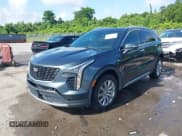 ✅ 2021 Cadillac XT4 FWD Premium Luxury • VIN: 1GYFZCR42MF007617 • Лот: 42437974. Опубликован ранее на IAAI с пробегом 126 071 миль. Бесплатный доступ к архиву аукционных продаж из США и подробный отчёт об истории автомобиля на DreamBid. Изображение 2.
