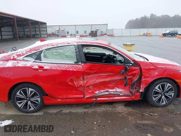 ✅ 2018 Honda Civic EX-T • VIN: JHMFC1F33JX009856 • Lot: 43631342. Listed on IAAI with 139,371 mi. Free auction sales archive from the USA and detailed vehicle history report at DreamBid. Image 14.