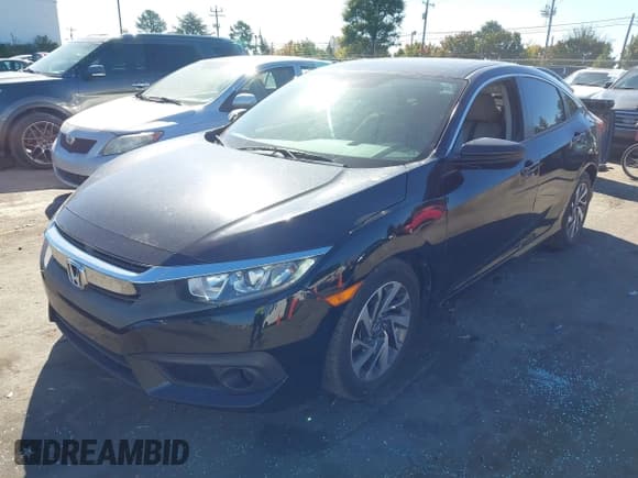 ✅ 2018 Honda Civic EX • VIN: 19XFC2F8XJE028374 • Lot: 43507603. Listed on IAAI with 154,556 mi. Free auction sales archive from the USA and detailed vehicle history report at DreamBid. Image 2.