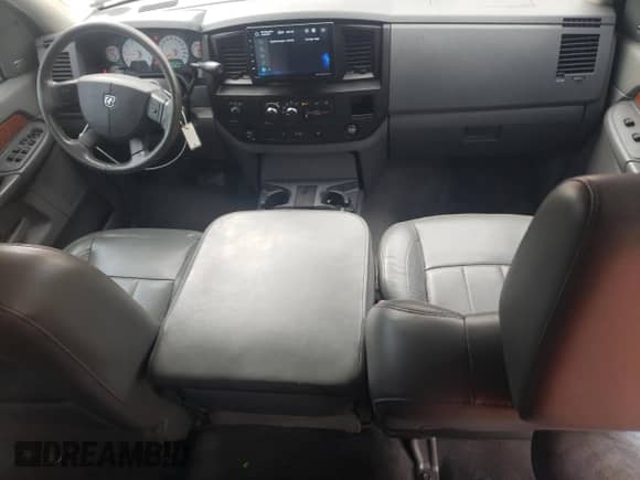 2006 Dodge 1500 SLT z VIN 1D7HU18286S571340, wystawiony jako Copart lot #69976264 z przebiegiem 168 812 mil mil oraz Szkoda całkowita • Salvage title. Historia ofert i sprzedaży dostępna na DreamBid. Obrazek 8.