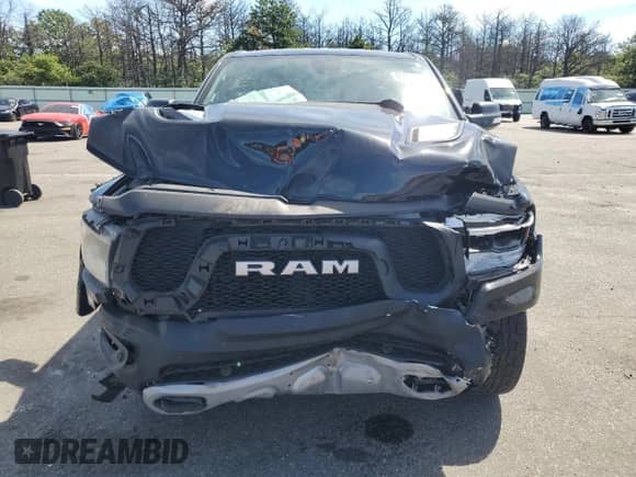 2019 Ram 1500 Rebel z VIN 1C6SRFLT0KN698856, wystawiony jako Copart lot #69225485 z przebiegiem 143 146 mil mil oraz Szkoda całkowita • Salvage title. Historia ofert i sprzedaży dostępna na DreamBid. Obrazek 5.