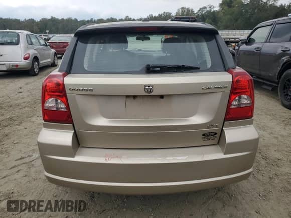 2010 Dodge Caliber SXT с VIN 1B3CB4HA2AD536021, выставлен на аукционе Copart как лот 72540154 с пробегом 239 942 миль миль и Списание • Salvage title. История ставок и продаж доступна на DreamBid. Изображение 6.