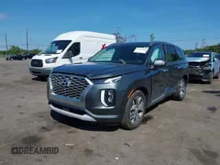 2022 Hyundai Palisade Limited z VIN KM8R54HE1NU405988, wystawiony jako IAAI lot #43269990 z przebiegiem 51 201 mil mil oraz . Historia ofert i sprzedaży dostępna na DreamBid. Obrazek 2.