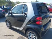 ✅ 2009 Smart fortwo Pure • VIN: WMEEJ31X19K220847 • Lot: 42817145. Listed on IAAI with 130,888 mi. Free auction sales archive from the USA and detailed vehicle history report at DreamBid. Image 3.