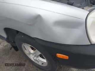 2001 Hyundai Santa Fe GLS z VIN KM8SC83DX1U054408, wystawiony jako IAAI lot #41498025 z przebiegiem 159 366 mil mil oraz . Historia ofert i sprzedaży dostępna na DreamBid. Obrazek 6.