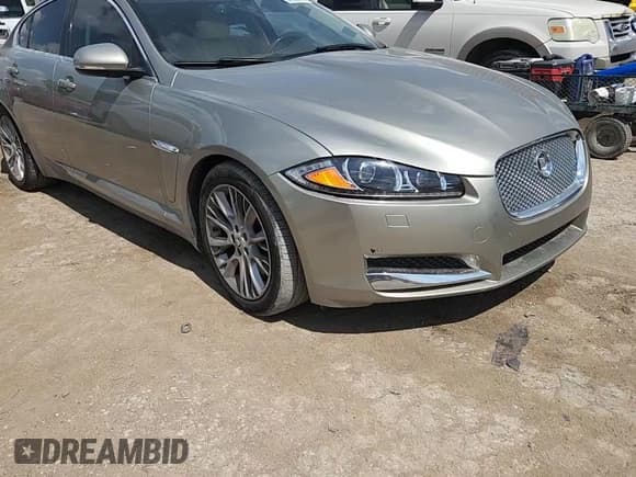 ✅ 2013 Jaguar XF RWD • VIN: SAJWA0E79D8S95654 • Lot: 64668775. Listed on Copart with 148,413 mi. Free auction sales archive from the USA and detailed vehicle history report at DreamBid. Image 13.