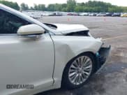 ✅ 2013 Lincoln MKZ • VIN: 3LN6L2G96DR805178 • Lot: 42915934. Wystawiony na IAAI z przebiegiem 158 757 mil. Bezpłatny archiwum sprzedaży aukcyjnych z USA i szczegółowy raport historii pojazdu na DreamBid. Zdjęcie 13.
