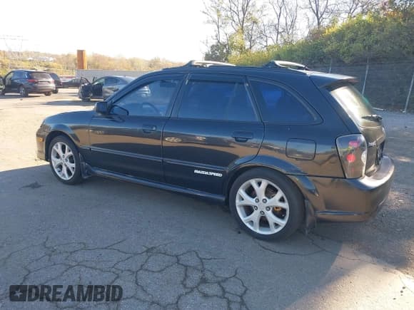 ✅ 2002 Mazda Protege • VIN: JM1BJ245821521889 • Лот: 43636379. Опубликован ранее на IAAI с пробегом 231 106 миль. Бесплатный доступ к архиву аукционных продаж из США и подробный отчёт об истории автомобиля на DreamBid. Изображение 3.