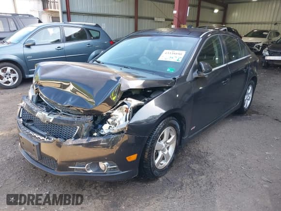 ✅ 2014 Chevrolet Cruze 1LT • VIN: 1G1PC5SB8E7263524 • Lot: 43338890. Listed on IAAI with 112,837 mi. Free auction sales archive from the USA and detailed vehicle history report at DreamBid. Image 2.