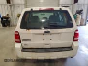 ✅ 2011 Ford Escape XLS • VIN: 1FMCU9C72BKC61048 • Lot: 90950575. Wystawiony na Copart z przebiegiem 161 206 mil. Bezpłatny archiwum sprzedaży aukcyjnych z USA i szczegółowy raport historii pojazdu na DreamBid. Zdjęcie 6.