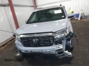 ✅ 2022 Honda Passport EX-L • VIN: 5FNYF7H52NB000679 • Lot: 41449757. Listed on IAAI with 38,672 mi. Free auction sales archive from the USA and detailed vehicle history report at DreamBid. Image 12.