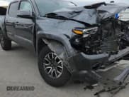 ✅ 2023 Toyota Tacoma TRD Sport • VIN: 3TMCZ5AN1PM557548 • Лот: 82419795. Опубликован ранее на Copart с пробегом 58 725 миль. Бесплатный доступ к архиву аукционных продаж из США и подробный отчёт об истории автомобиля на DreamBid. Изображение 14.