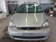 ✅ 2003 Ford Focus SE Fleet • VIN: 1FAFP36323W191551 • Lot: 42197413. Listed on IAAI with 142,713 mi. Free auction sales archive from the USA and detailed vehicle history report at DreamBid. Image 6.