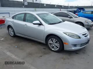 ✅ 2010 Mazda 6 i Touring • VIN: 1YVHZ8CH2A5M31639 • Lot: 43267670. Listed on IAAI with 143,644 mi. Free auction sales archive from the USA and detailed vehicle history report at DreamBid. Image 1.
