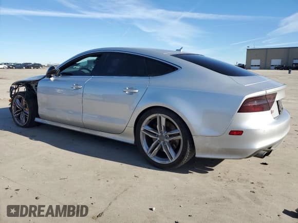 ✅ 2013 Audi S7 Prestige • VIN: WAU32AFC6DN143622 • Лот: 41494165. Опубликован ранее на Copart с пробегом 93 475 миль. Бесплатный доступ к архиву аукционных продаж из США и подробный отчёт об истории автомобиля на DreamBid. Изображение 2.