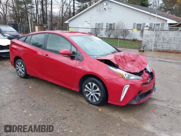 ✅ 2020 Toyota Prius LE • VIN: JTDL9RFU5L3018496 • Lot: 43782967. Listed on IAAI with 100,146 mi. Free auction sales archive from the USA and detailed vehicle history report at DreamBid. Image 1.