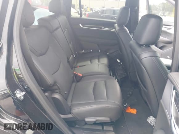 ✅ 2023 Cadillac XT6 FWD Premium Luxury • VIN: 1GYKPCRS6PZ106284 • Lot: 41595617. Listed on IAAI with 32,795 mi. Free auction sales archive from the USA and detailed vehicle history report at DreamBid. Image 8.