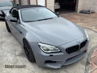 ✅ 2016 BMW M6 • VIN: WBS6G9C54GD932196 • Lot: 53960063. Wystawiony na Copart z przebiegiem 46 162 mil. Bezpłatny archiwum sprzedaży aukcyjnych z USA i szczegółowy raport historii pojazdu na DreamBid. Zdjęcie 1.