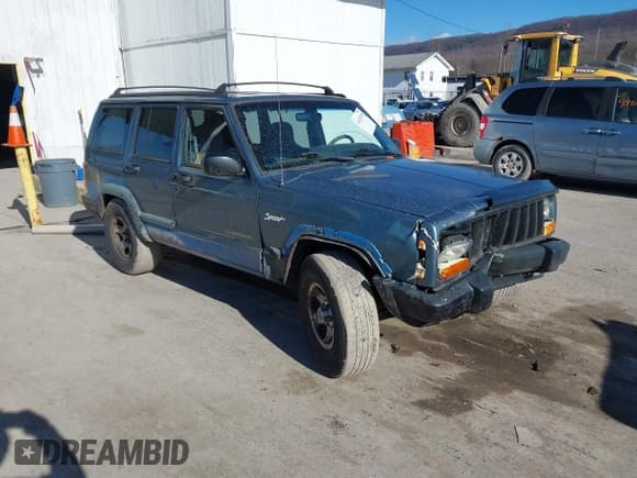 ✅ 1998 Jeep Cherokee Sport • VIN: 1J4FJ68S0WL281203 • Lot: 41474335. Listed on IAAI with 247,028 mi. Free auction sales archive from the USA and detailed vehicle history report at DreamBid. Image 1.