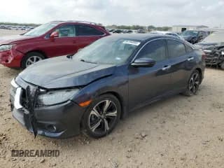 ✅ 2017 Honda Civic Touring • VIN: 19XFC1F97HE002599 • Lot: 86194955. Listed on Copart with 63,600 mi. Free auction sales archive from the USA and detailed vehicle history report at DreamBid. Image 1.