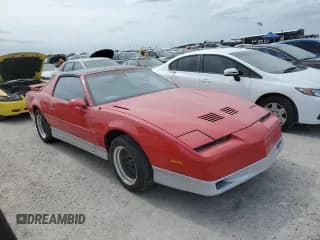 ✅ 1987 Pontiac Firebird • VIN: 1G2FW21F2HL234386 • Lot: 76476474. Listed on Copart with 35,593 mi. Free auction sales archive from the USA and detailed vehicle history report at DreamBid. Image 4.