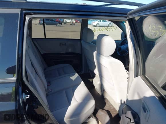 2002 Toyota Highlander z VIN JTEGF21A220060795, wystawiony jako IAAI lot #43306106 z przebiegiem 212 705 mil mil oraz . Historia ofert i sprzedaży dostępna na DreamBid. Obrazek 8.