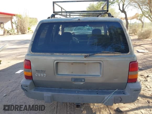 ✅ 1995 Jeep Grand Cherokee Laredo • VIN: 1J4GZ58S9SC569349 • Lot: 43305892. Listed on IAAI with 209,279 mi. Free auction sales archive from the USA and detailed vehicle history report at DreamBid. Image 15.