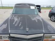 ✅ 1989 Cadillac Brougham • VIN: 1G6DW51Y6KR730868 • Лот: 42315431. Опубликован ранее на IAAI с пробегом 90 027 миль. Бесплатный доступ к архиву аукционных продаж из США и подробный отчёт об истории автомобиля на DreamBid. Изображение 6.