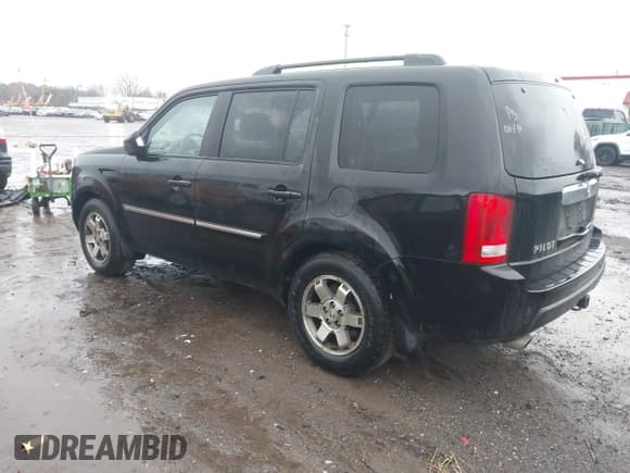 ✅ 2010 Honda Pilot Touring • VIN: 5FNYF4H92AB005361 • Lot: 43778618. Listed on IAAI with 243,937 mi. Free auction sales archive from the USA and detailed vehicle history report at DreamBid. Image 3.