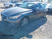 ✅ 2014 Infiniti Q50 Premium • VIN: JN1BV7ARXEM693629 • Lot: 43677891. Listed on IAAI with 224,891 mi. Free auction sales archive from the USA and detailed vehicle history report at DreamBid. Image 2.