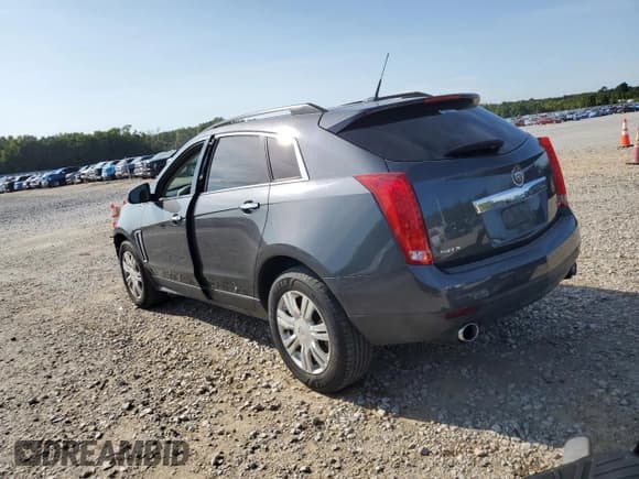 ✅ 2013 Cadillac SRX • VIN: 3GYFNAE36DS603676 • Lot: 71913975. Listed on Copart with 128,766 mi. Free auction sales archive from the USA and detailed vehicle history report at DreamBid. Image 2.