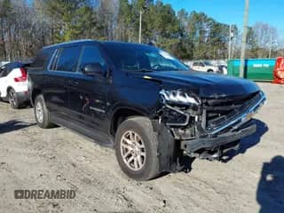 2021 Chevrolet Suburban LT z VIN 1GNSCCKD0MR195186, wystawiony jako IAAI lot #41621859 z przebiegiem 129 691 mil mil oraz . Historia ofert i sprzedaży dostępna na DreamBid. Obrazek 1.