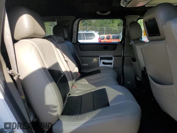 ✅ 2004 Hummer H2 • VIN: 5GRGN23U64H115086 • Lot: 70512504. Wystawiony na Copart z przebiegiem 243 233 mil. Bezpłatny archiwum sprzedaży aukcyjnych z USA i szczegółowy raport historii pojazdu na DreamBid. Zdjęcie 11.