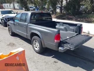 ✅ 2002 Dodge Dakota SLT • VIN: 1B7HL48N32S587531 • Lot: 42266638. Wystawiony na IAAI z przebiegiem 151 397 mil. Bezpłatny archiwum sprzedaży aukcyjnych z USA i szczegółowy raport historii pojazdu na DreamBid. Zdjęcie 3.