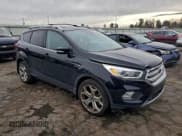✅ 2019 Ford Escape Titanium • VIN: 1FMCU9J92KUA49310 • Lot: 94258065. Listed on Copart with 40,827 mi. Free auction sales archive from the USA and detailed vehicle history report at DreamBid. Image 4.