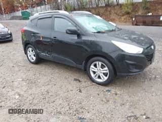 2010 Hyundai Tucson GLS z VIN KM8JUCAC8AU042134, wystawiony jako IAAI lot #43564698 z przebiegiem 77 937 mil mil oraz . Historia ofert i sprzedaży dostępna na DreamBid. Obrazek 1.