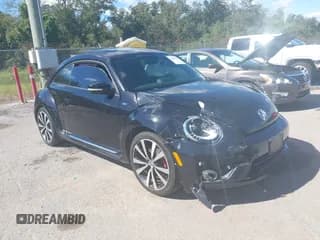 ✅ 2014 Volkswagen Beetle Turbo R-Line • VIN: 3VWVS7AT3EM632252 • Lot: 43546417. Wystawiony na IAAI z przebiegiem 142 247 mil. Bezpłatny archiwum sprzedaży aukcyjnych z USA i szczegółowy raport historii pojazdu na DreamBid. Zdjęcie 1.