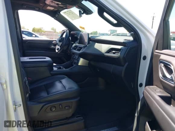 2022 Chevrolet Tahoe Z71 z VIN 1GNSKPKD1NR158062, wystawiony jako IAAI lot #42576884 z przebiegiem 51 083 mil mil oraz . Historia ofert i sprzedaży dostępna na DreamBid. Obrazek 5.