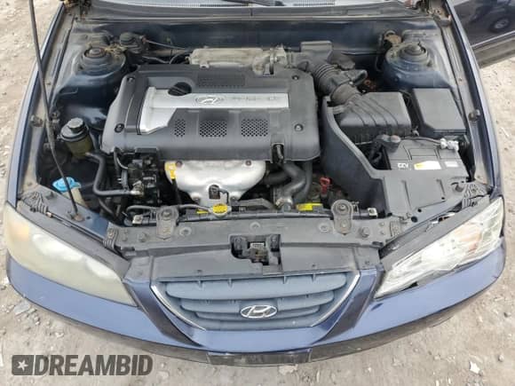 2005 Hyundai Elantra GLS z VIN KMHDN46D75U146640, wystawiony jako Copart lot #81188684 z przebiegiem 223 869 mil mil oraz Szkoda całkowita • Salvage title. Historia ofert i sprzedaży dostępna na DreamBid. Obrazek 11.