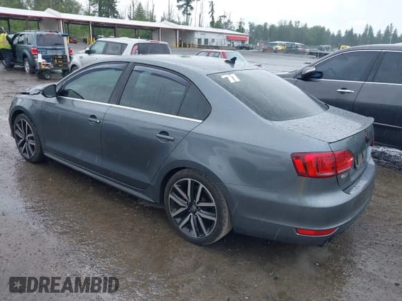 ✅ 2014 Volkswagen Jetta GLI • VIN: 3VW4T7AJ2EM208598 • Lot: 42381855. Listed on IAAI with 82,761 mi. Free auction sales archive from the USA and detailed vehicle history report at DreamBid. Image 3.