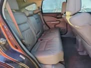 ✅ 2014 Honda CR-V EX-L • VIN: 2HKRM3H77EH552359 • Лот: 93198195. Опубликован ранее на Copart с пробегом 130 773 миль. Бесплатный доступ к архиву аукционных продаж из США и подробный отчёт об истории автомобиля на DreamBid. Изображение 11.