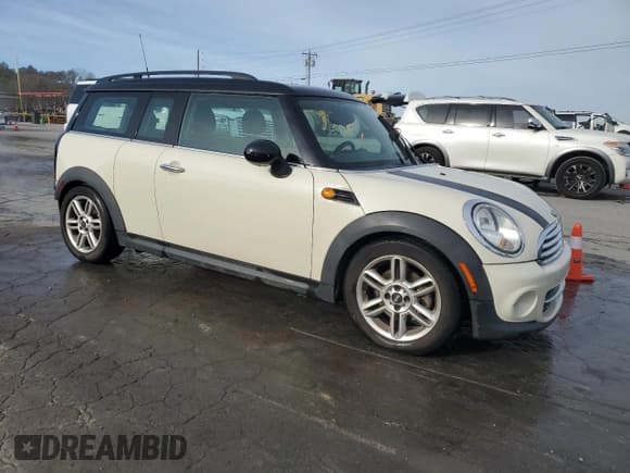 ✅ 2011 MINI Clubman • VIN: WMWZF3C53BTX81917 • Lot: 90080935. Listed on Copart with 119,868 mi. Free auction sales archive from the USA and detailed vehicle history report at DreamBid. Image 4.