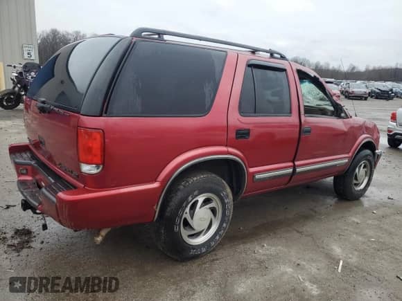 2001 Chevrolet Blazer LT z VIN 1GNDT13W012153280, wystawiony jako Copart lot #85602694 z przebiegiem 119 810 mil mil oraz Szkoda całkowita • Salvage title. Historia ofert i sprzedaży dostępna na DreamBid. Obrazek 3.