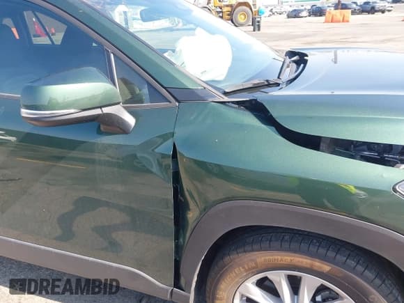 ✅ 2023 Toyota Corolla Cross LE • VIN: 7MUCAAAG3PV042624 • Lot: 42185430. Listed on IAAI with 28,039 mi. Free auction sales archive from the USA and detailed vehicle history report at DreamBid. Image 17.