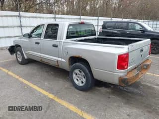 ✅ 2005 Dodge Dakota SLT • VIN: 1D7HE48N55S300470 • Lot: 43579452. Wystawiony na IAAI z przebiegiem 218 140 mil. Bezpłatny archiwum sprzedaży aukcyjnych z USA i szczegółowy raport historii pojazdu na DreamBid. Zdjęcie 3.